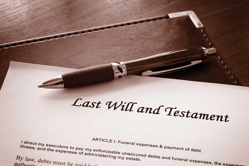 Last Will and Testament document with pen